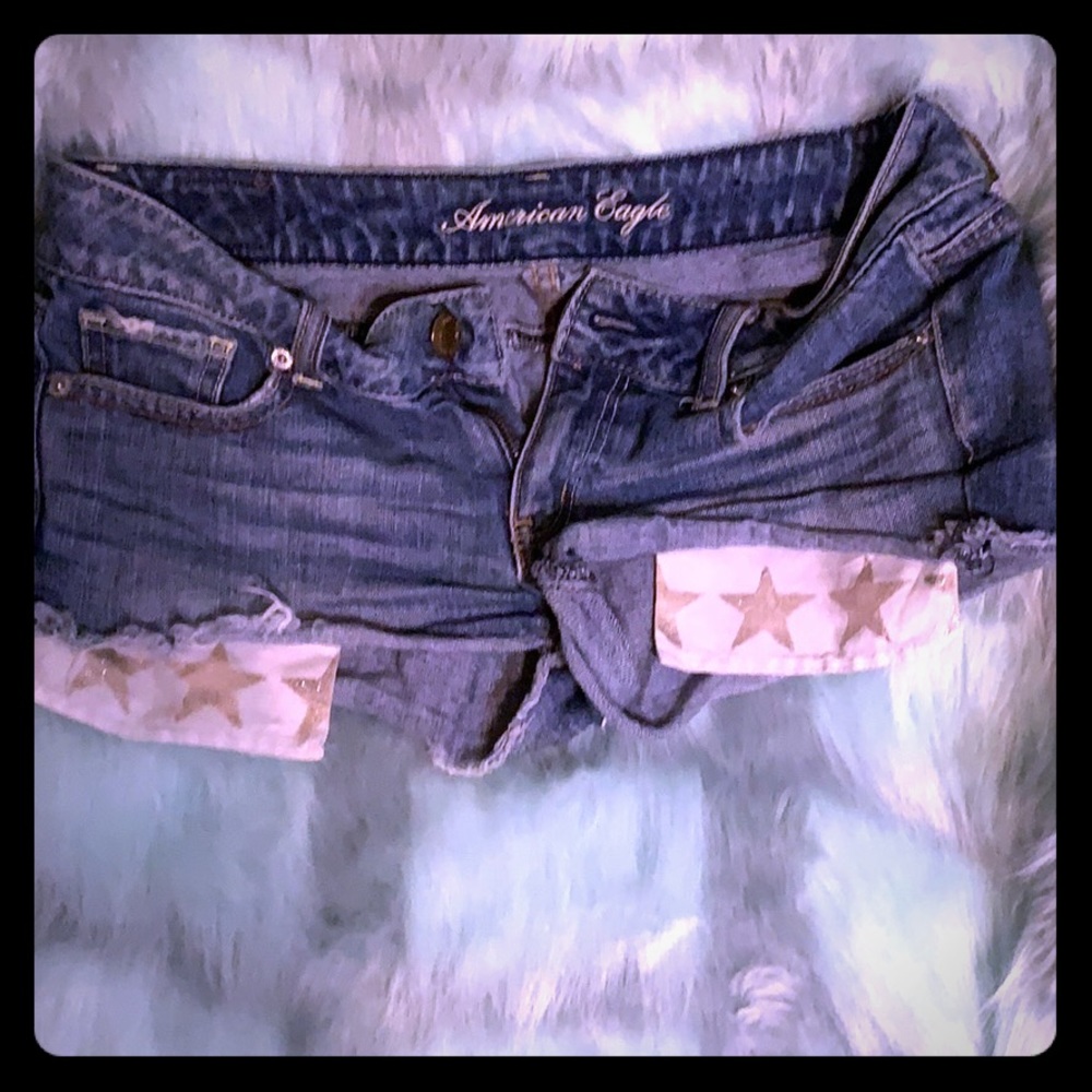 American Eagle medium wash peekaboo jean shorts